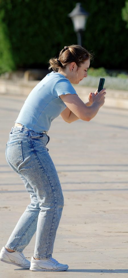 小蓝视频 App 收藏与历史记录界面截图，列表条目带有封面缩略图与观看进度百分比，排版清晰